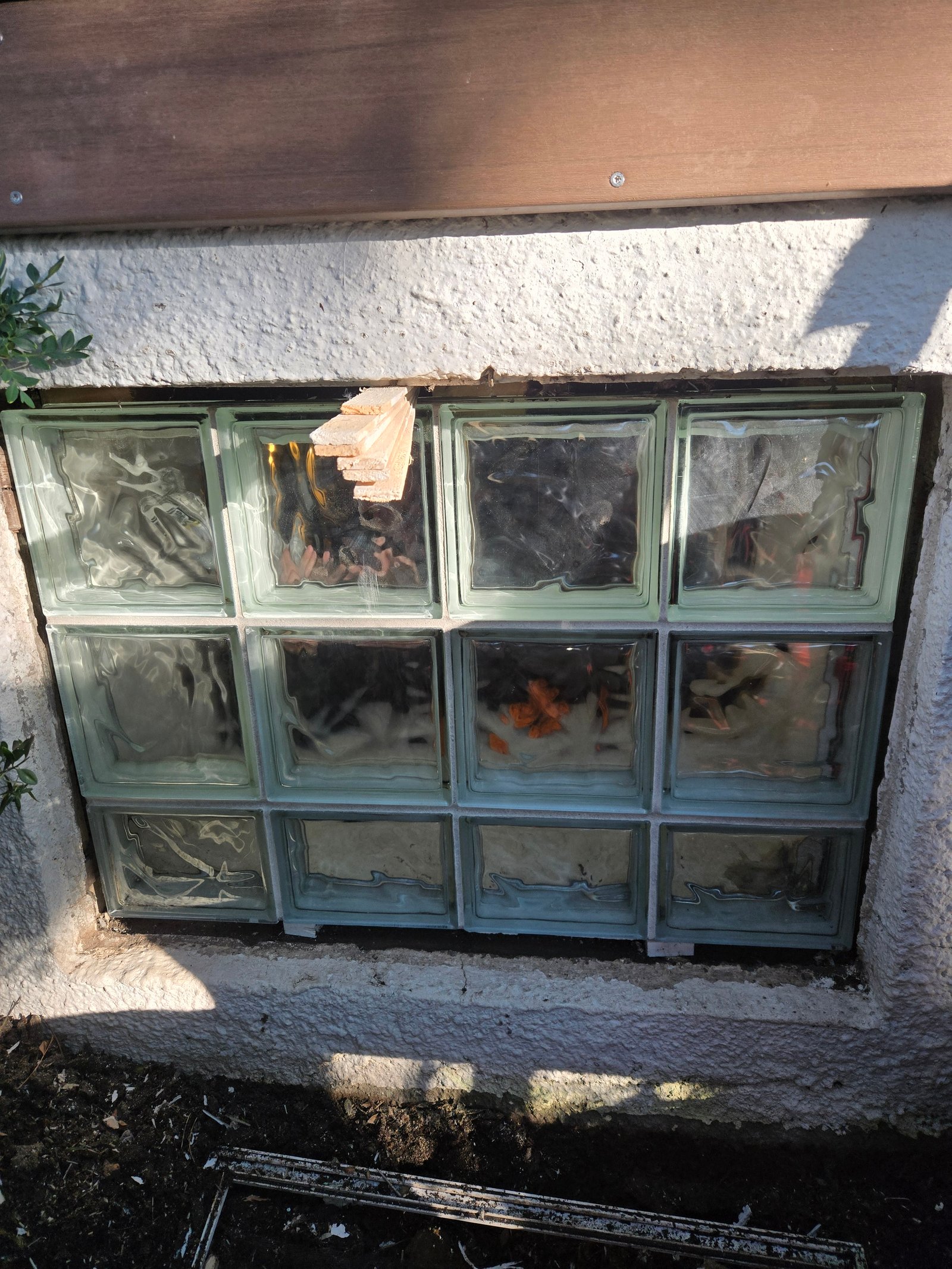 Glass block window close-up installation